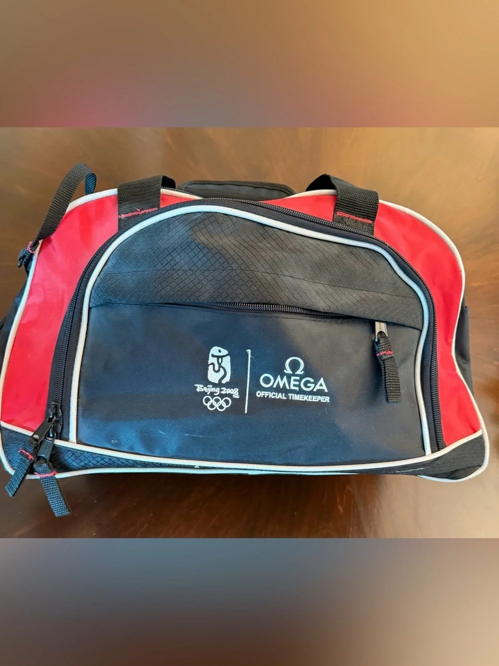Omega Red and Black Men's Travel Duffel with Teal Trim